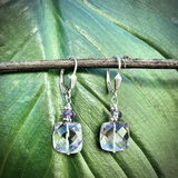 Faceted Amethyst Dangle Earrings with Green Leaf Background