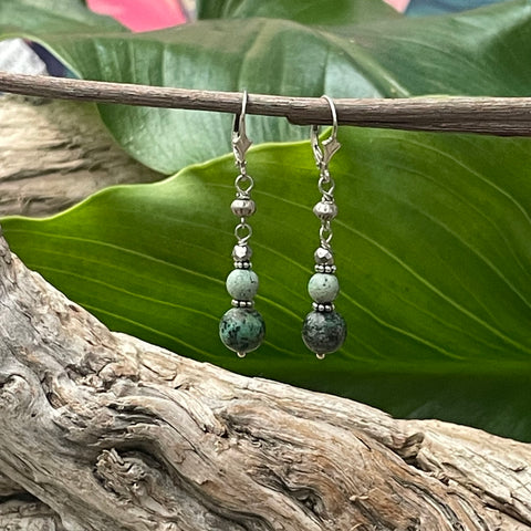 Green Amazonite & Labradorite Dangle Earrings with Green Leaf and Driftwood Background2