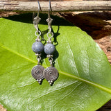 Lapis sterling silver earrings with spiral pendants and sterling silver ear wires. Measures 1 1/4"  in length.