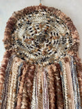 Dreamcatcher Jaguar Dreams. Brown and cream colored dreamcatcher with jaguar brass head with golden rhinestones and stitched beads.